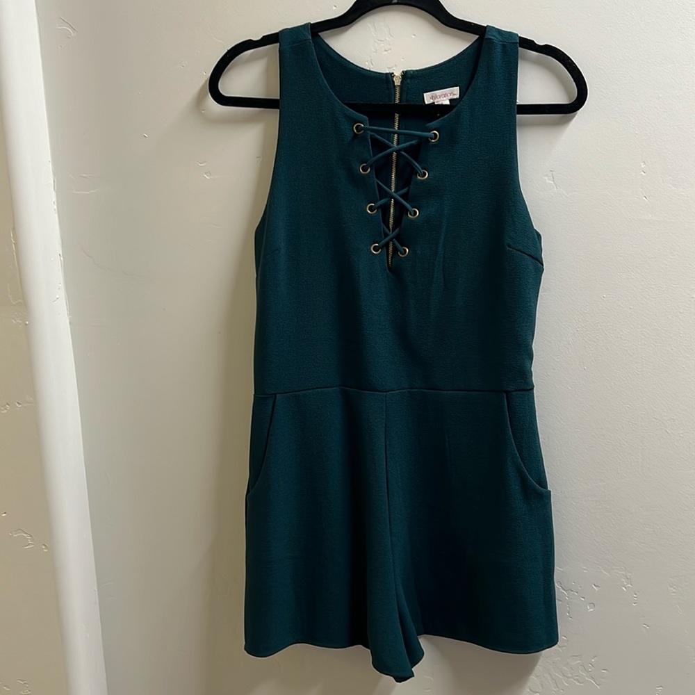 Size, small, rich, teal, colored romper.